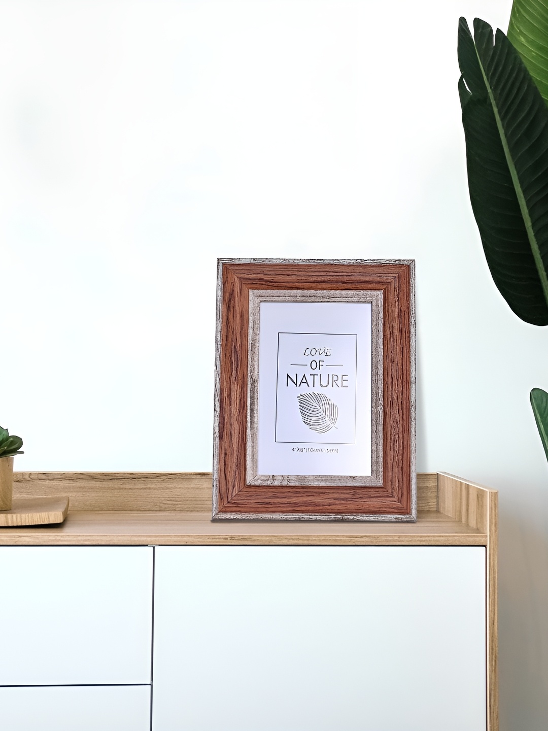

Aura Brown Wooden Table Photo Frames