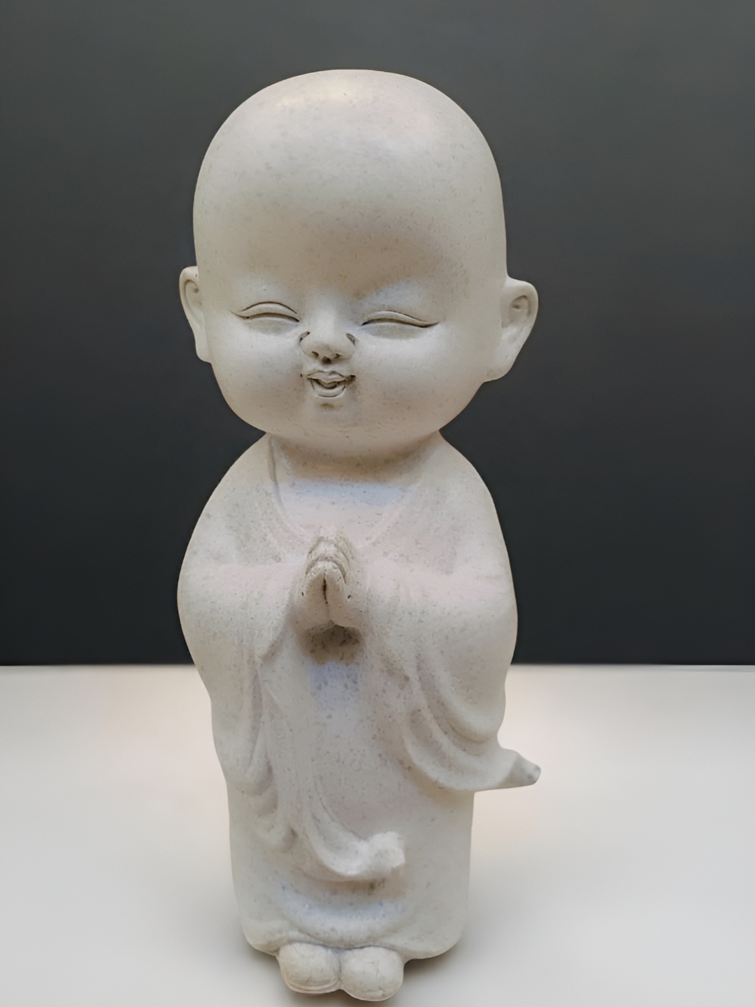 

NAYRA HANDICRAFTS White & Black Baby Monk Figurine Showpiece