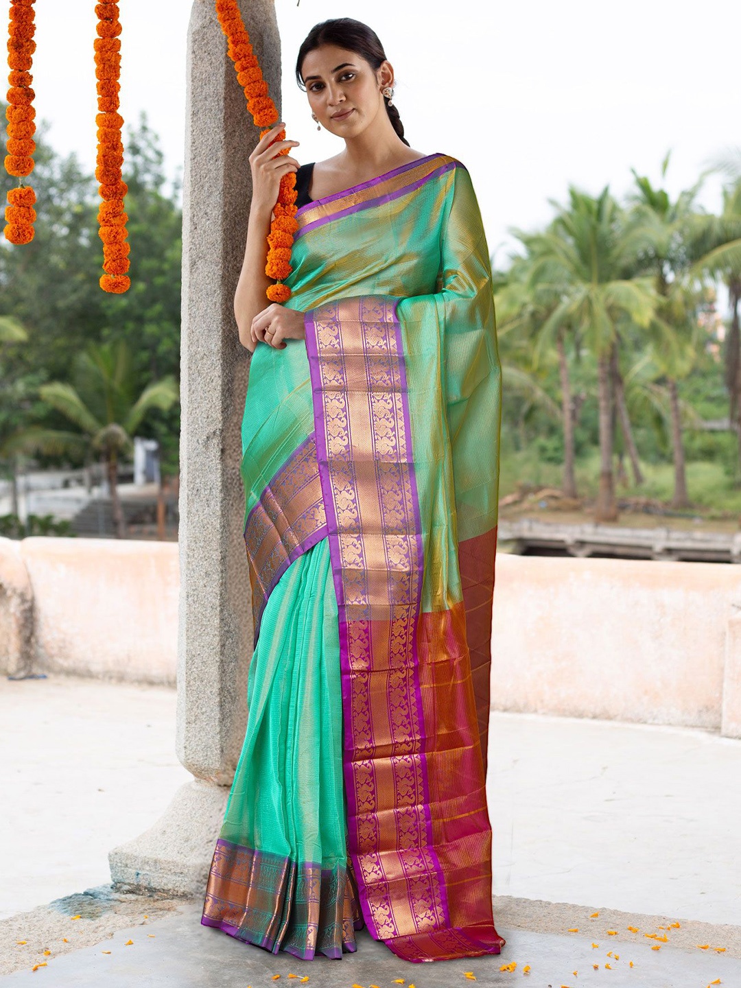 

Unnati Silks Woven Design Zari Pure Silk Gadwal Saree, Green