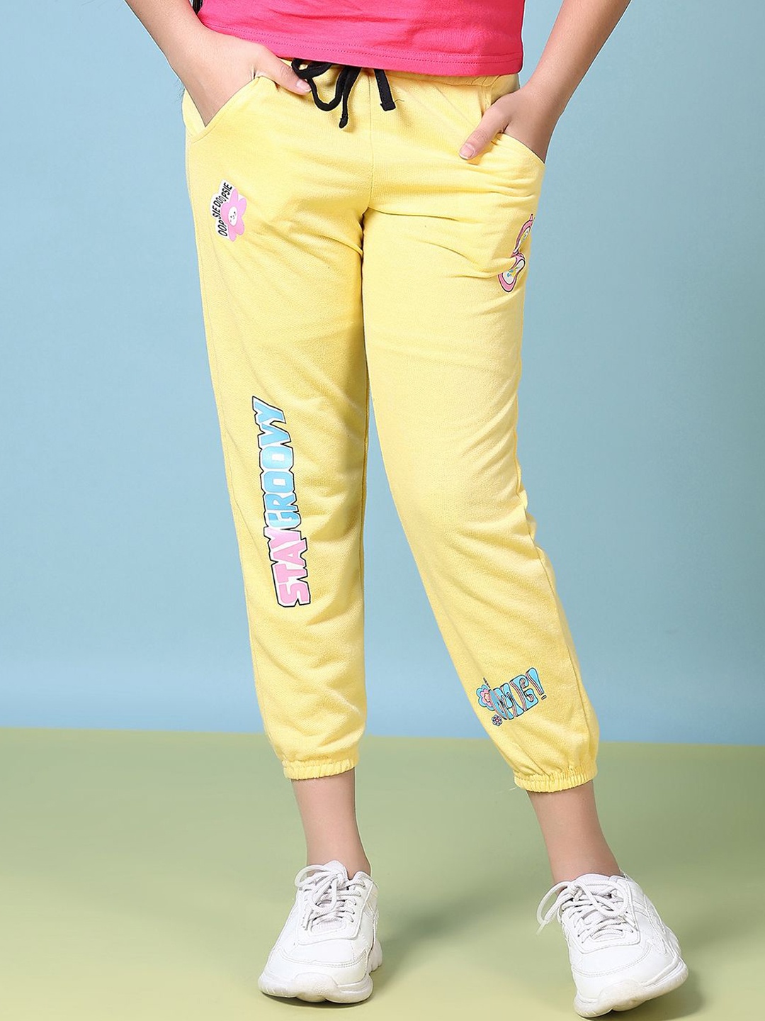 

V-Mart Girls Printed Mid-Rise Track Pants, Yellow