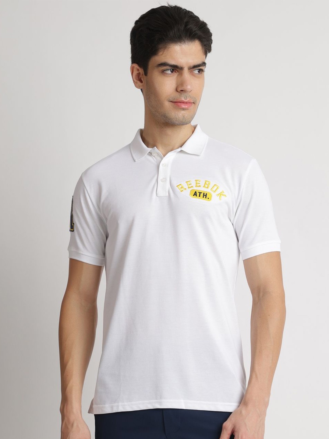 

Reebok Brand Logo Detail Polo T-Shirt, White