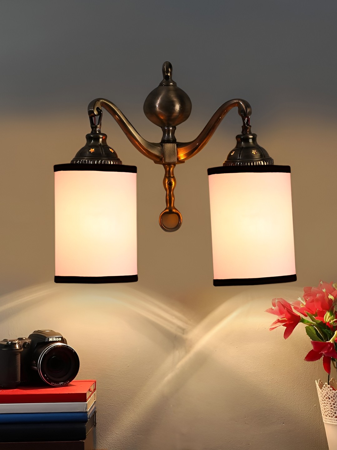 

Devansh White & Gold-Toned Metal Traditional Abstract Shaped Shaped Wall Lamp