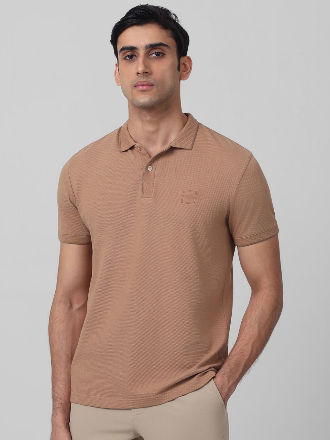 

Mufti Men Solid Textured Slim Fit Polo T-shirt, Brown