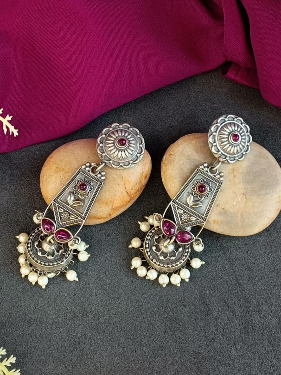 

Efulgenz Silver-Plated Dome Shaped Oxidised Crystals Jhumkas