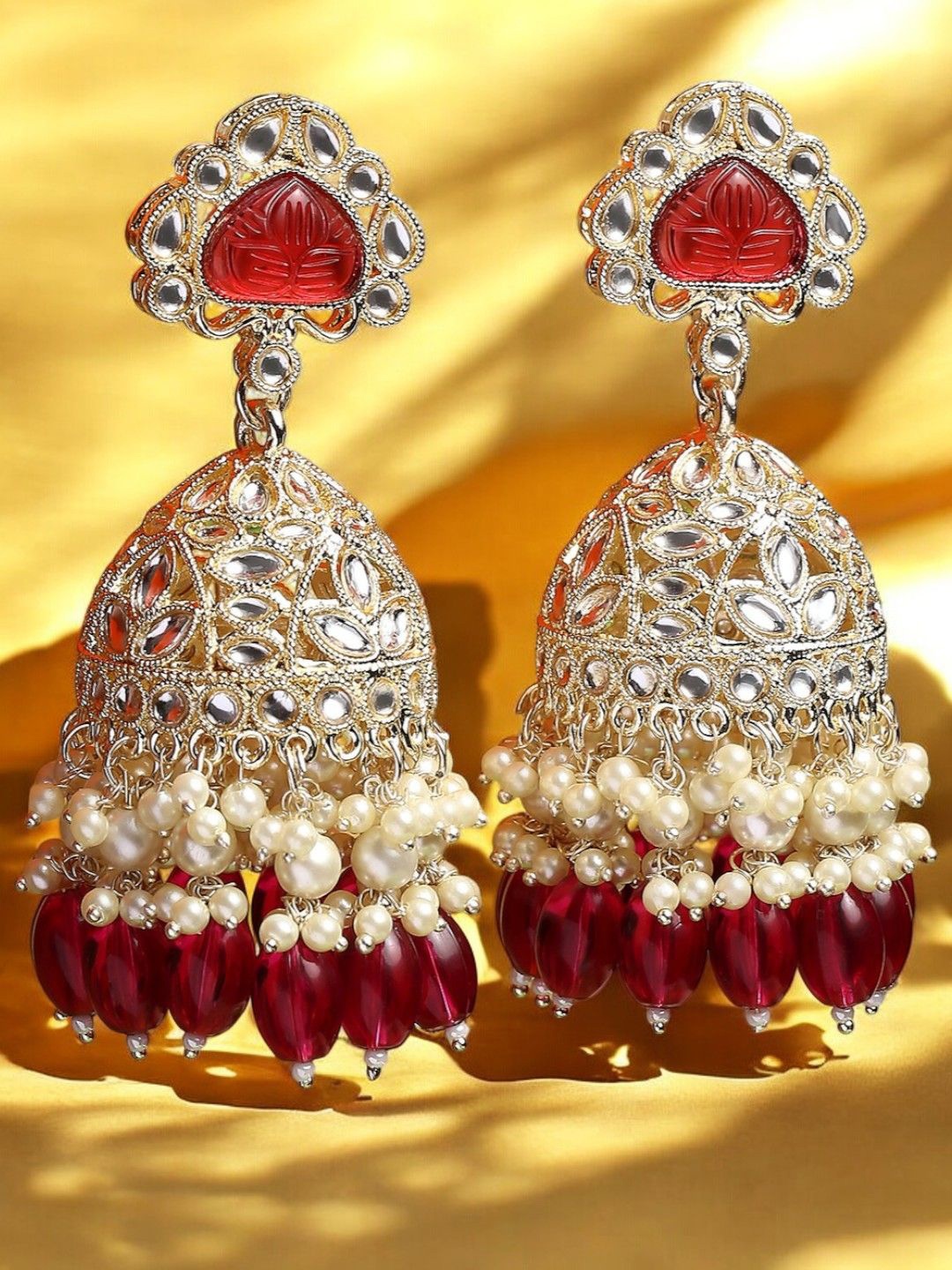 

Anouk Gold Toned Kundan Studded Dome Shaped Jhumkas