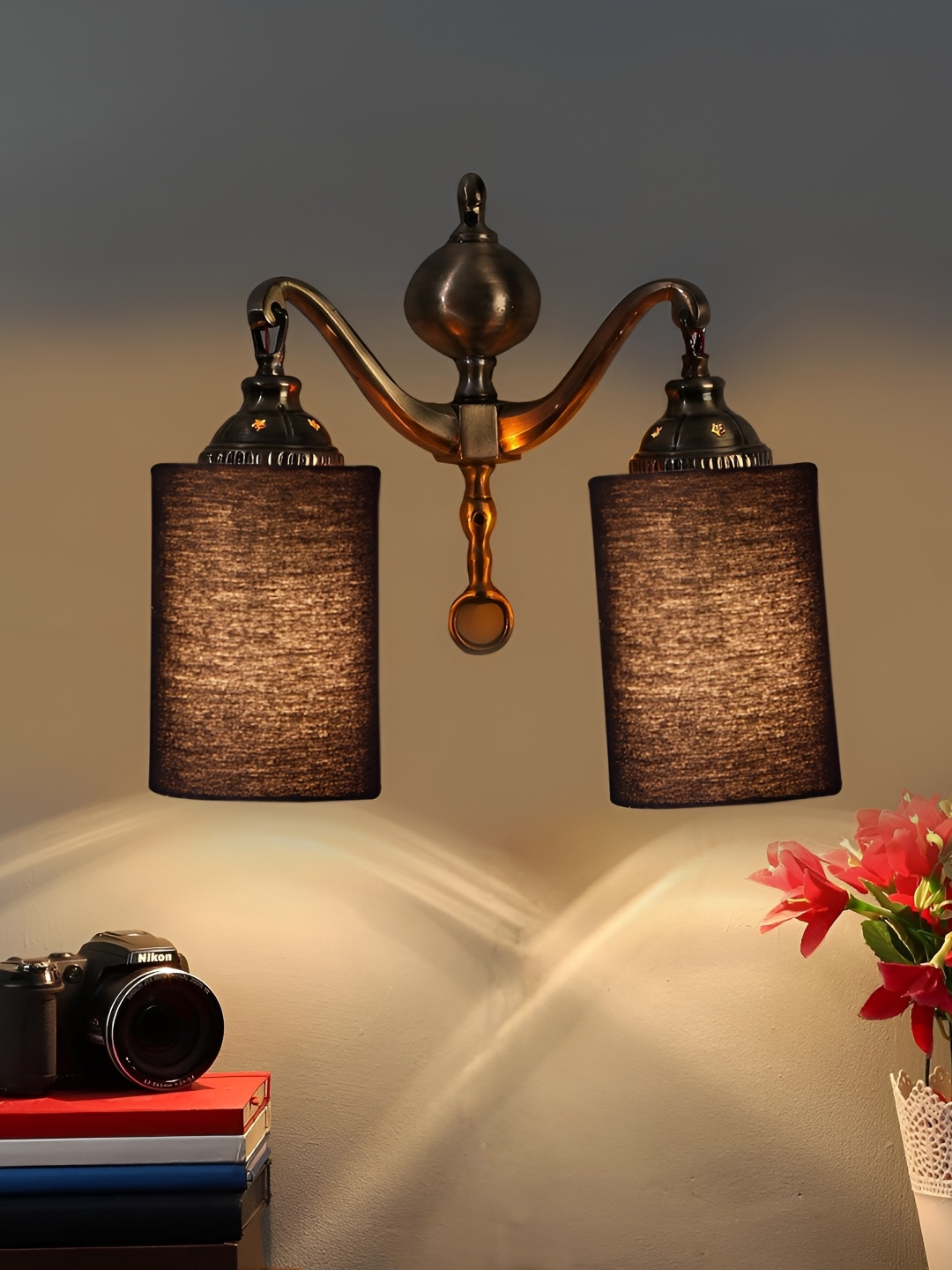 

Devansh Black & Gold-Toned Metal Contemporary Cylinder Shaped Wall Lamp