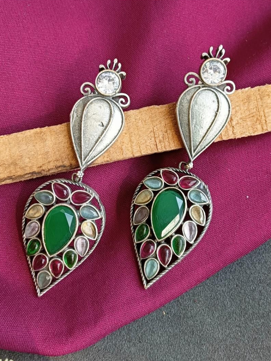 

Efulgenz Silver-Plated Oxidised Crystals Drop Earrings