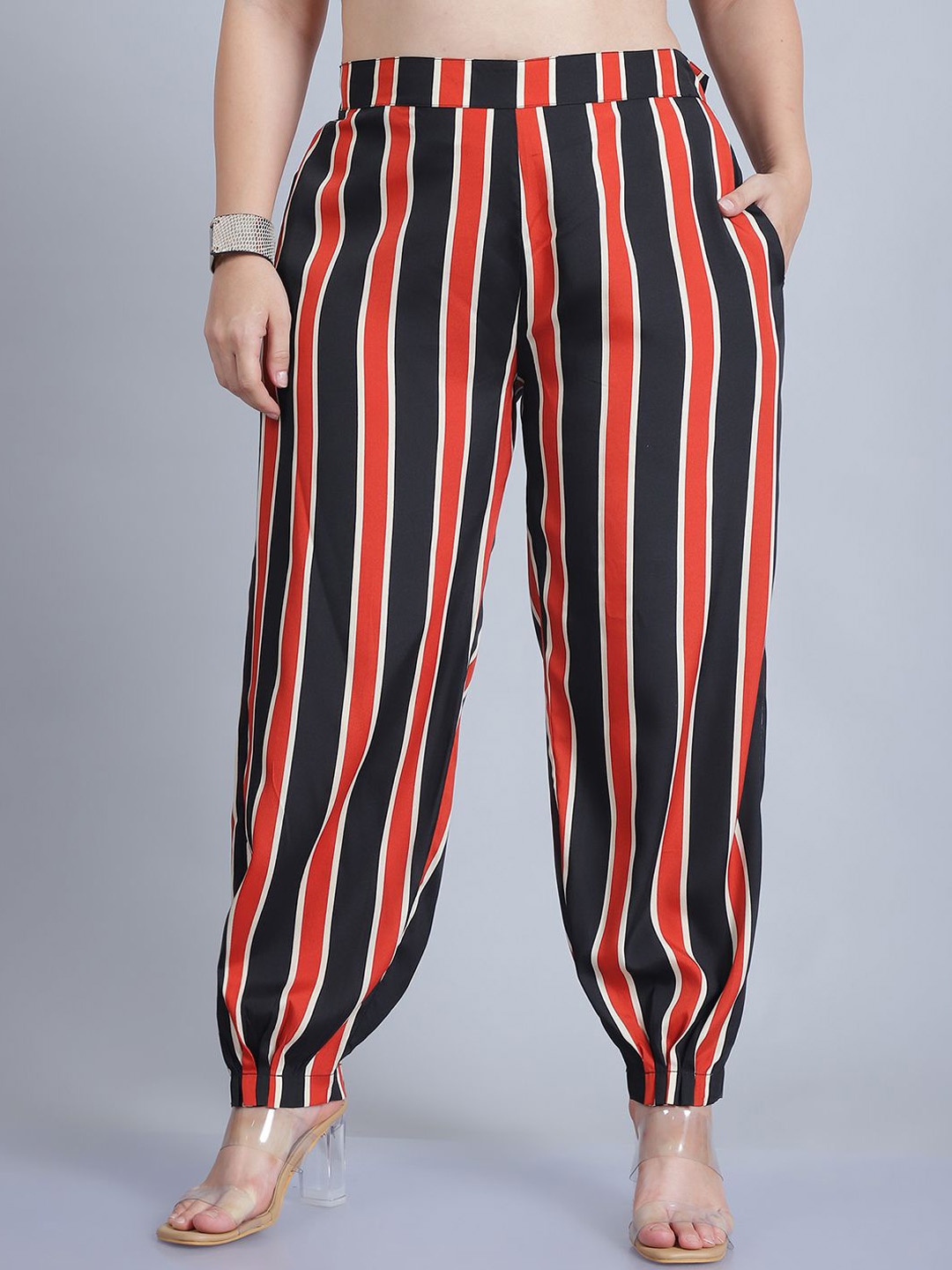 

Baawri Women Striped Mid-Rise Regular Fit Trousers, Rust