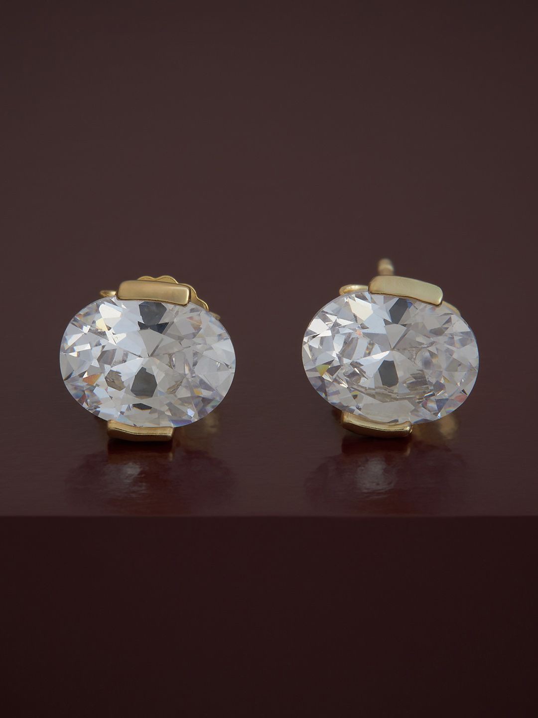 

Kushal's Fashion Jewellery Sterling Silver Zircon Gold-Plated Studs