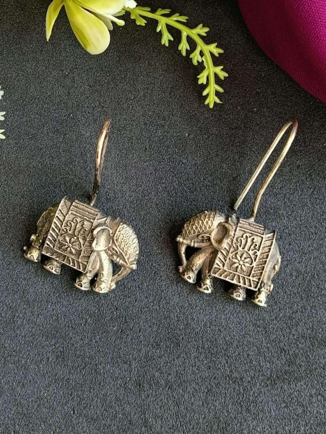 

Efulgenz Rhodium Plated Elephant Studs Earrings, Silver