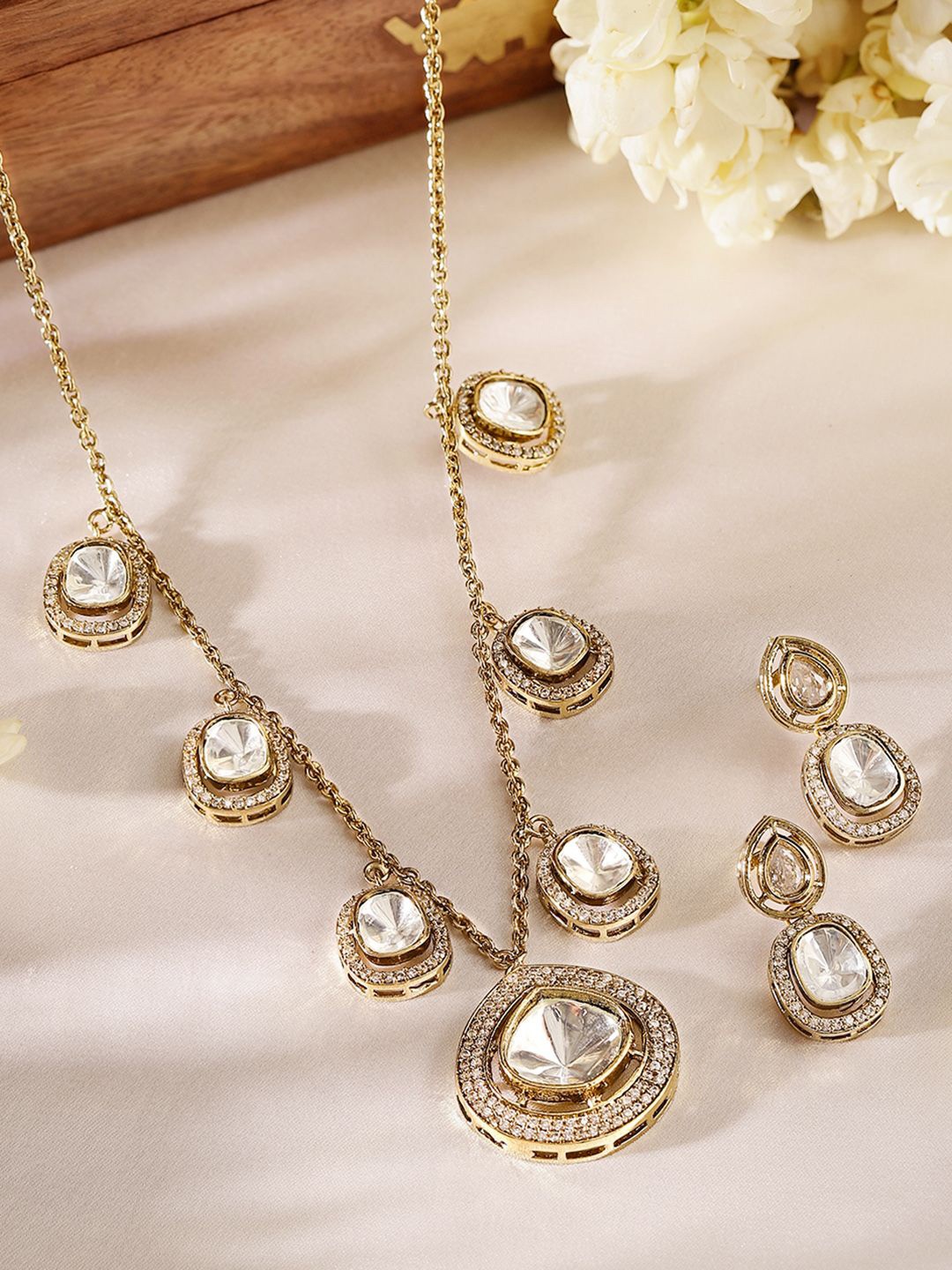 

Priyaasi Gold-Plated AD-Studded Necklace and Earrings