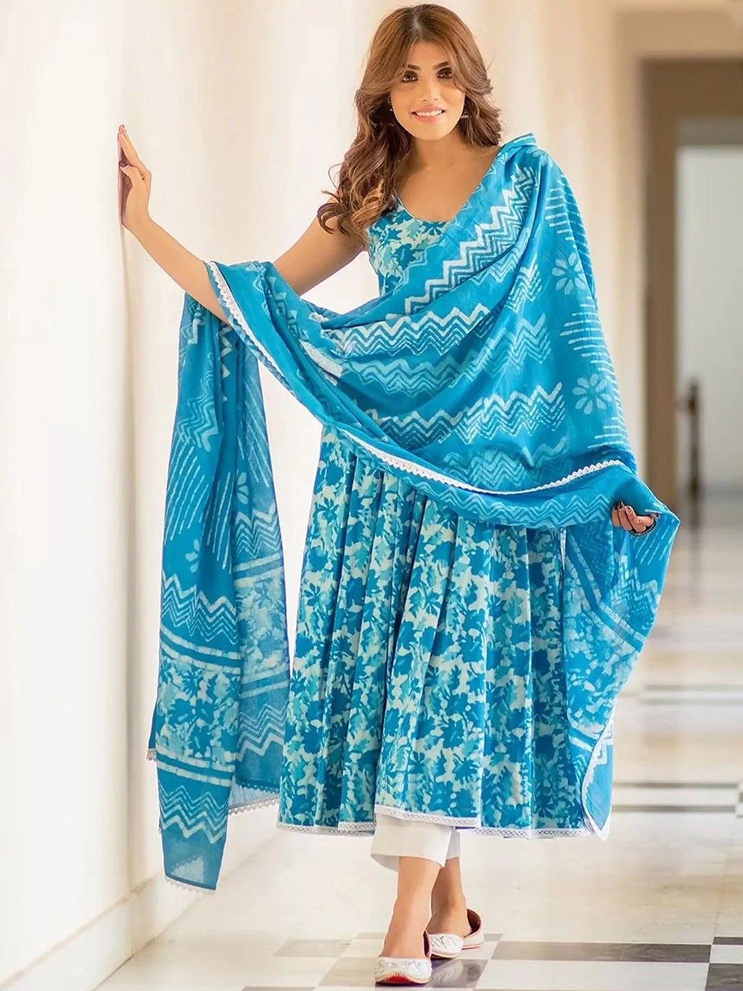 

KALINI Floral Printed Scoop Neck Sleeveless Anarkali Kurta with Trousers & Dupatta, Blue