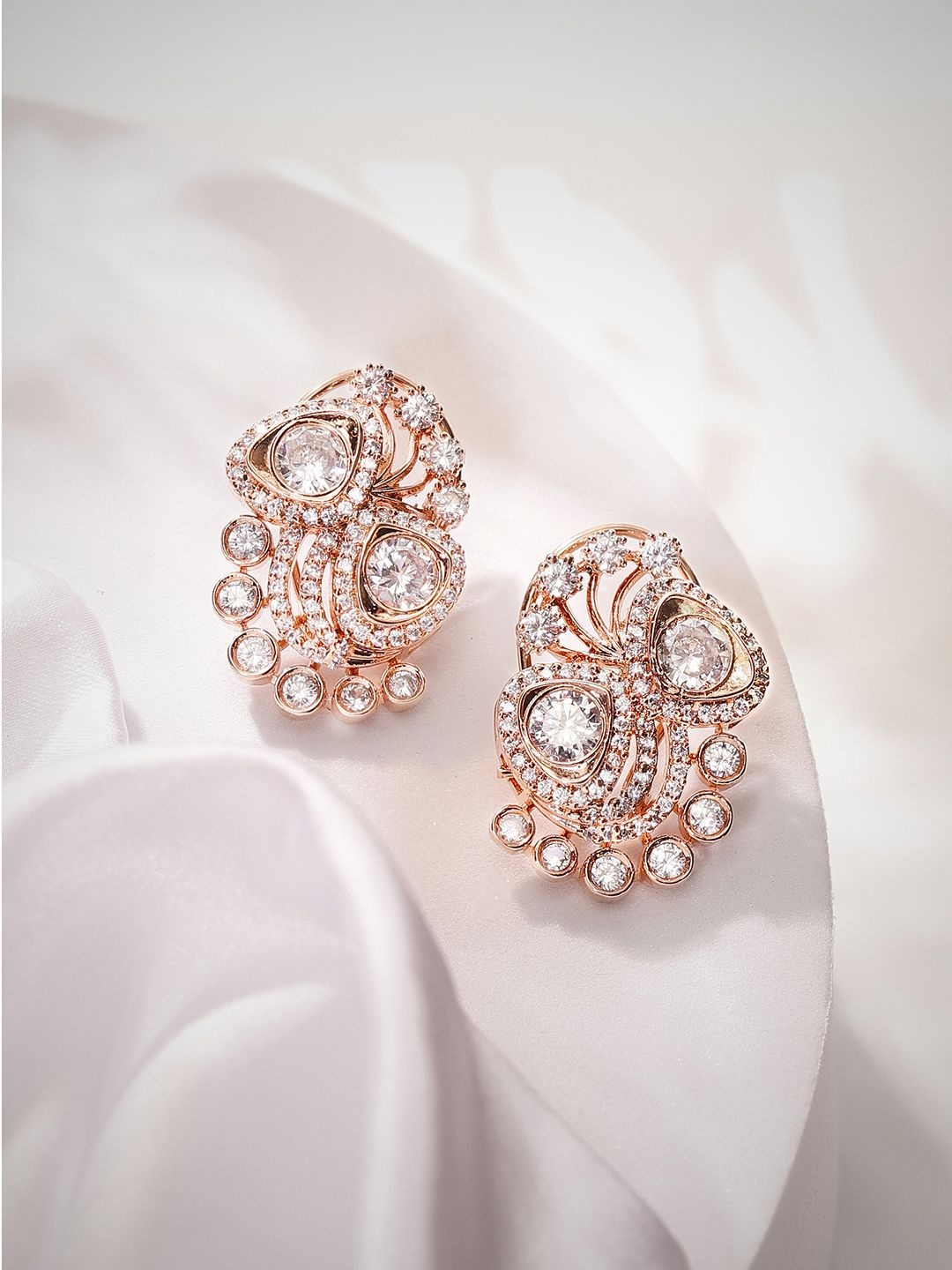 

Priyaasi Rose Gold-Plated American Diamond Stone Studded Contemporary Studs