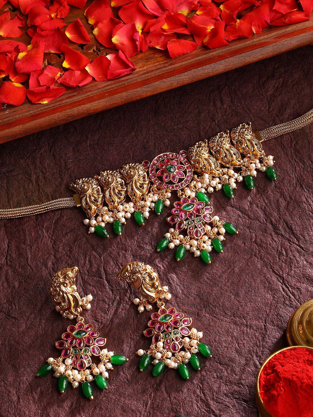 

Priyaasi Gold Plated Peacock Ruby Attigai Stone Studded & Beaded Floral Jewellery Set