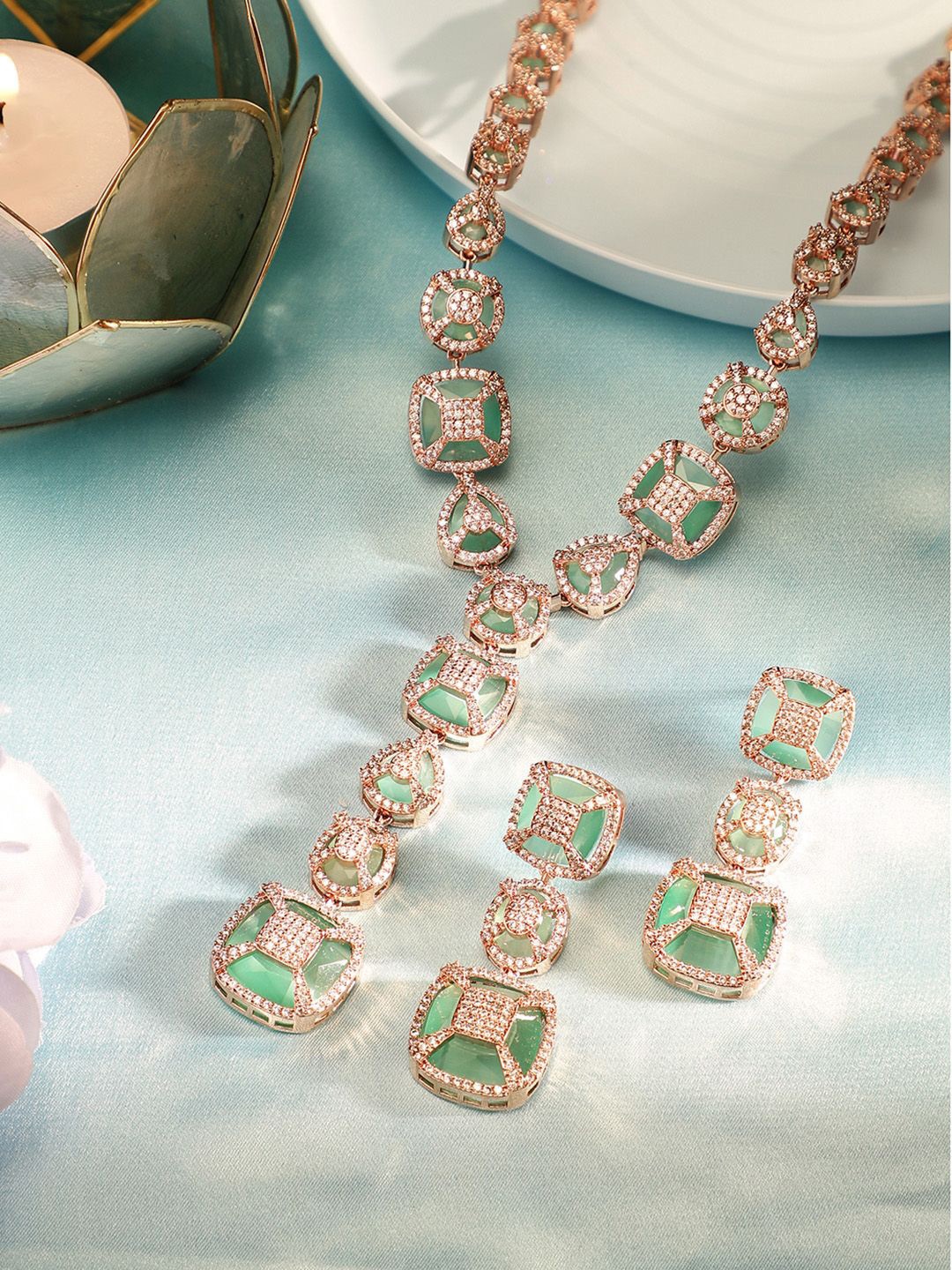 

Priyaasi Rose Gold-Plated American Diamond Stone Studded Jewellery Set