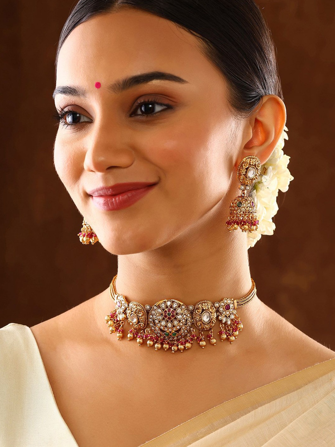 

Priyaasi Gold Plated Stone Studded & Beaded Necklace and Earrings
