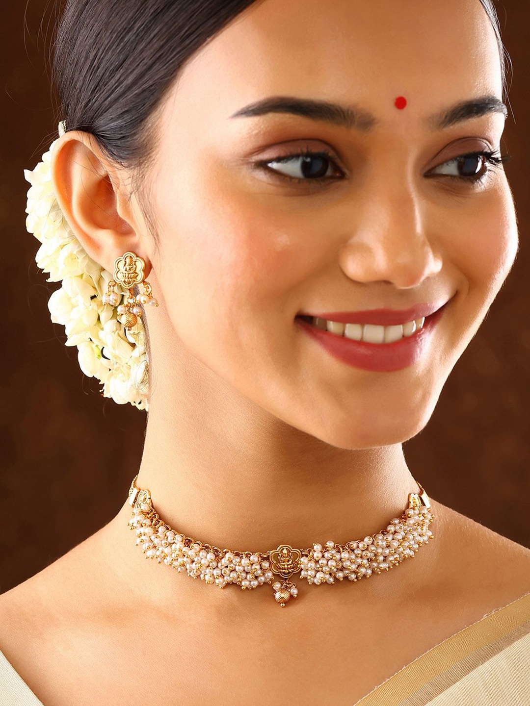 

Priyaasi Gold-Plated Pearls Beaded Lakshmi Pendant With Elegance Chocker Jewellery Set