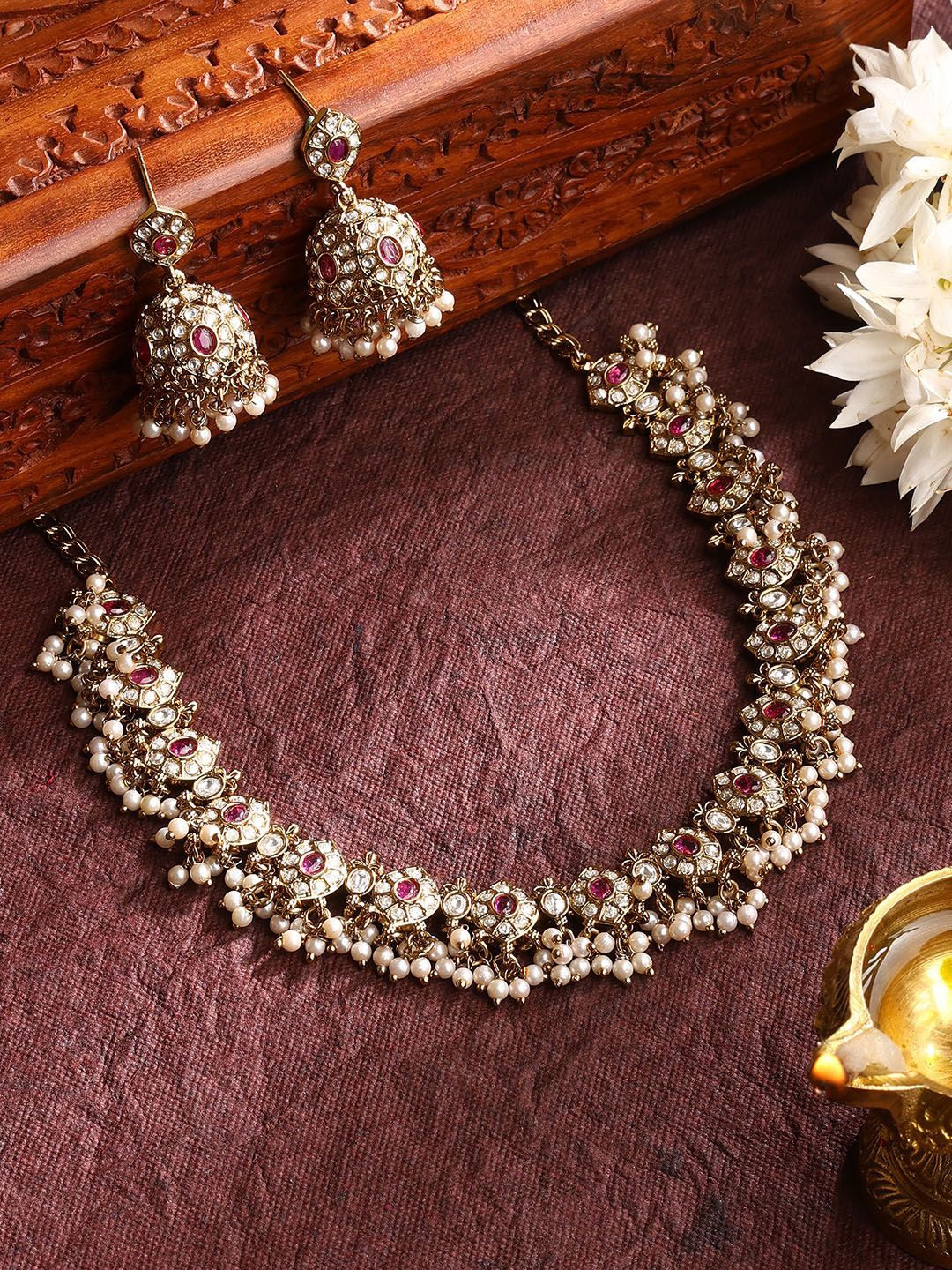 

Priyaasi Gold-Plated Floral Ruby Stones-Studded & Pearls Beaded Jewellery Set