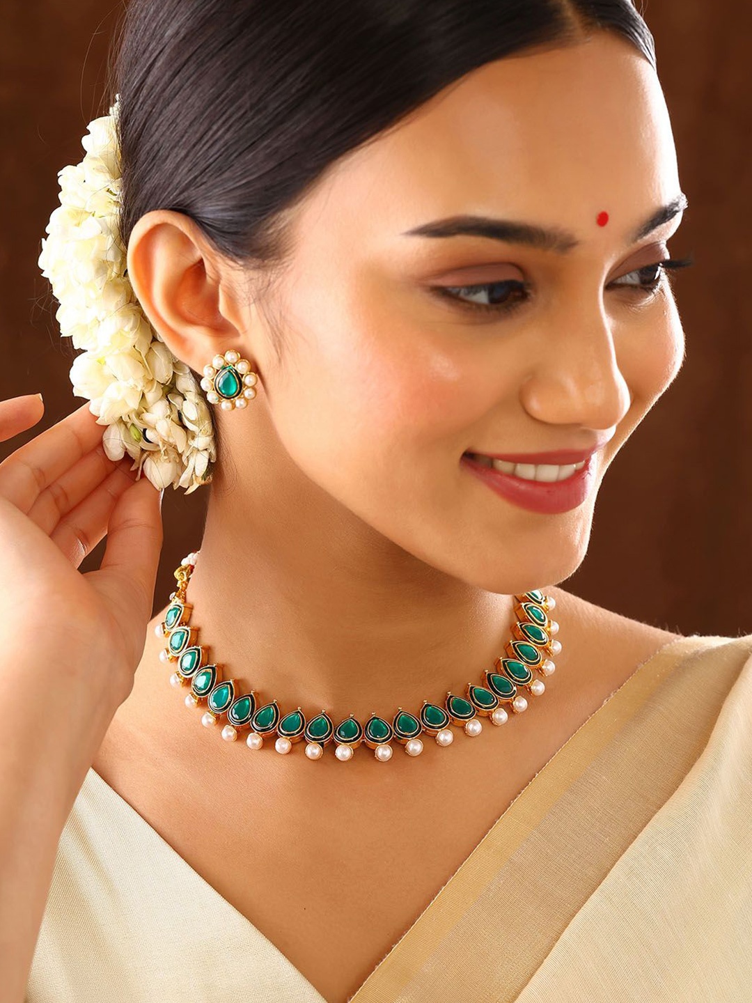 

Priyaasi Gold Plated Stone Studded & Beaded Necklace and Earrings