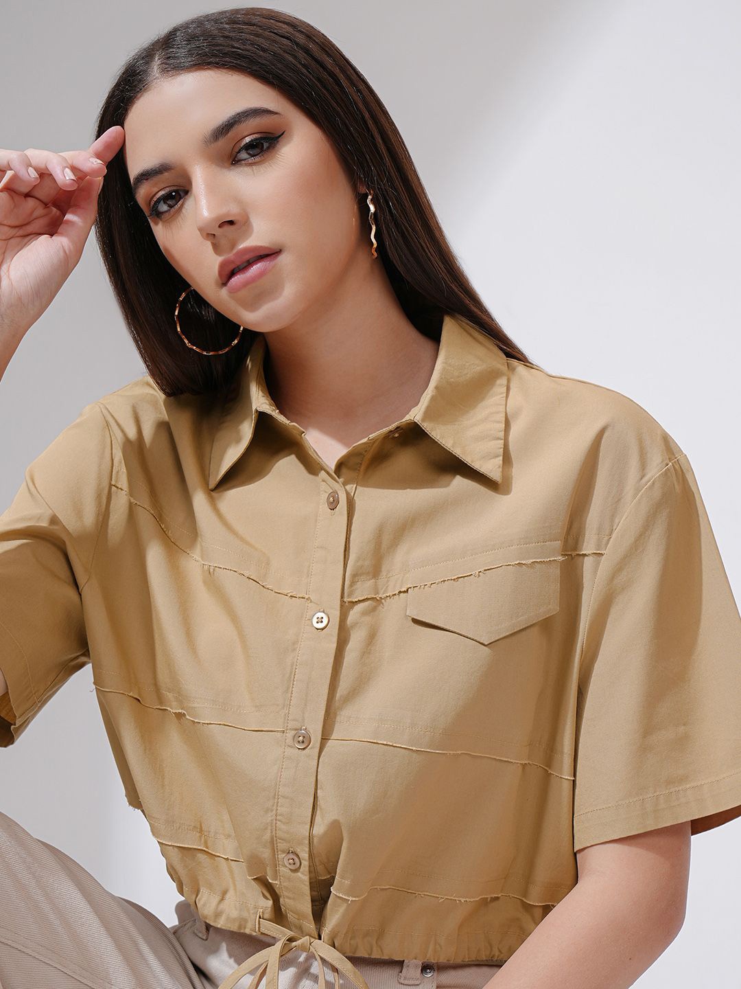 

Tokyo Talkies Women Solid Cropped Fitted Shirt, Beige