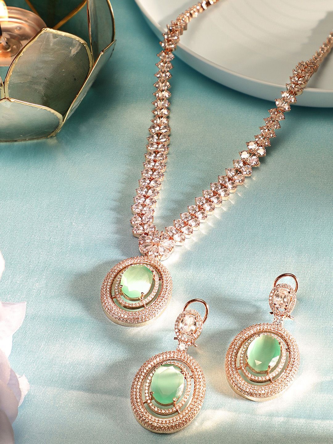 

Priyaasi Rose Gold Plated American Diamond Stone Studded Jewellery Set
