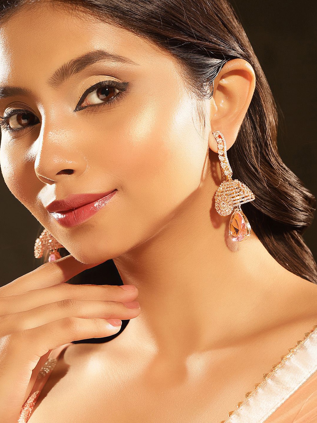 

Priyaasi Rose Gold-Plated American Diamond Stone Studded Contemporary Drop Earrings