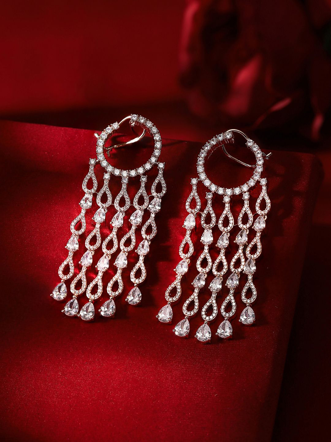 

Priyaasi Rose Gold-Plated AD-Stone Studded Teardrop Shaped Tasselled Drop Earrings