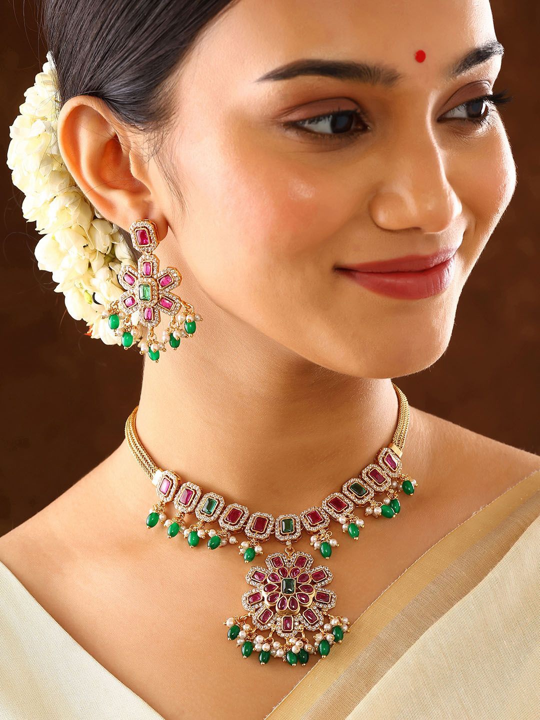 

Priyaasi Gold-Plated Blooming Elegance Stone Studded & Beaded Jewellery Set