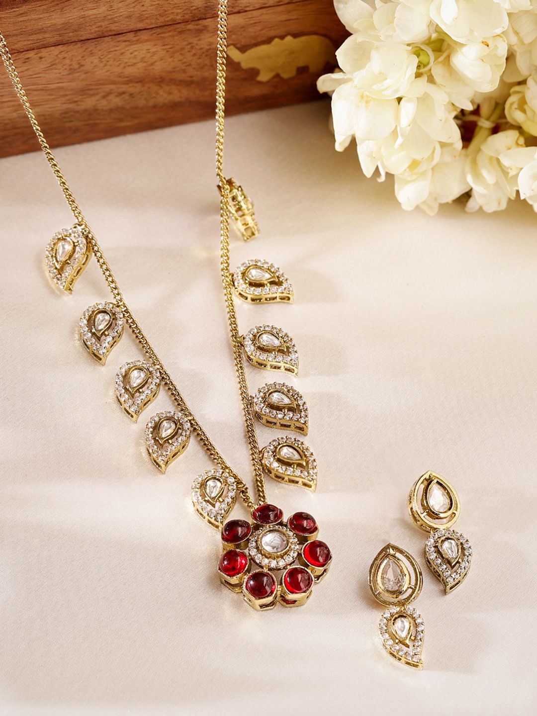 

Priyaasi Gold-Plated American Diamond Studded Jewellery Set