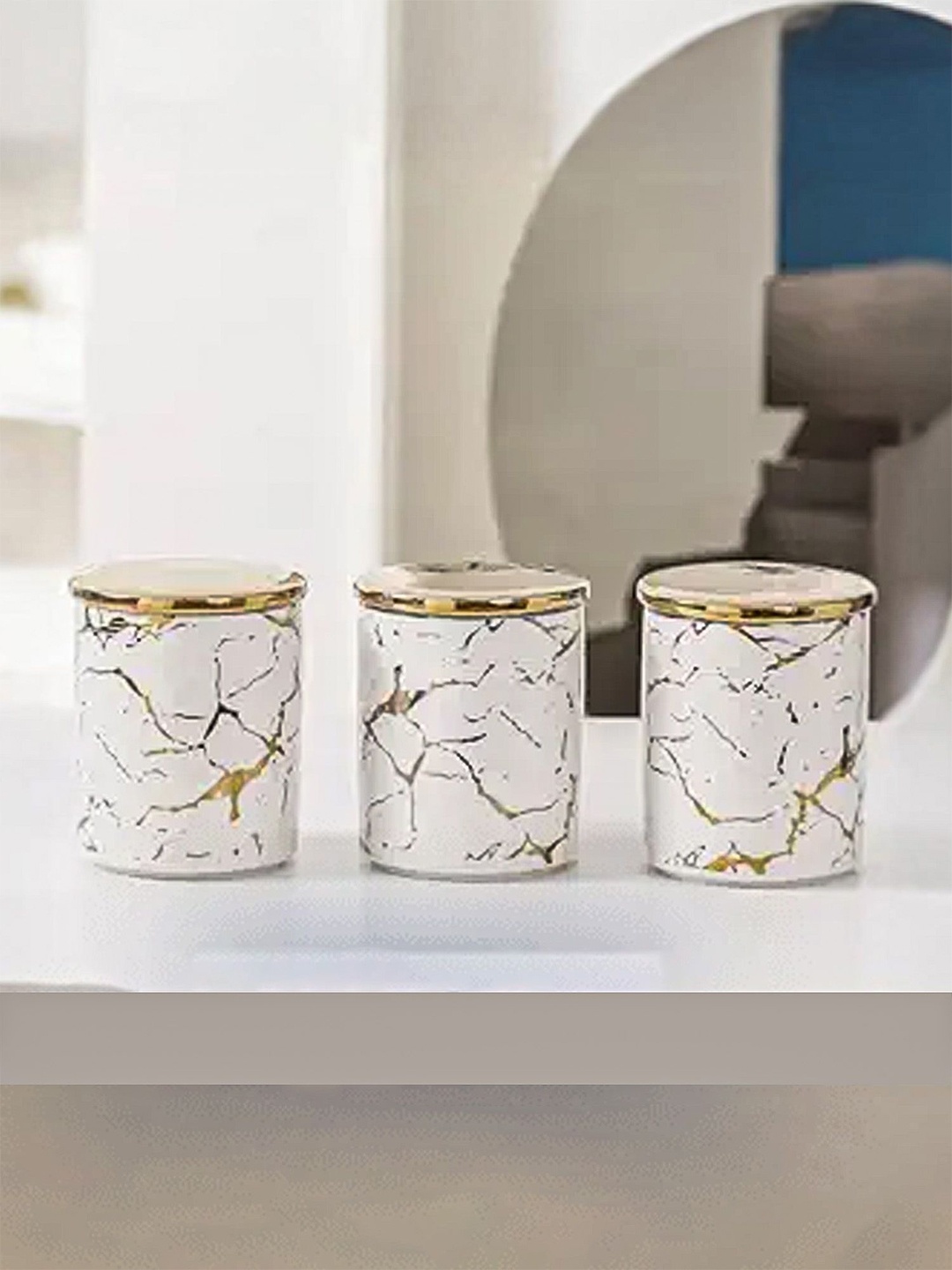 

Ekhasa White & Gold Toned 3 Pieces Printed Ceramic Canister Container With Lid -310ml Each