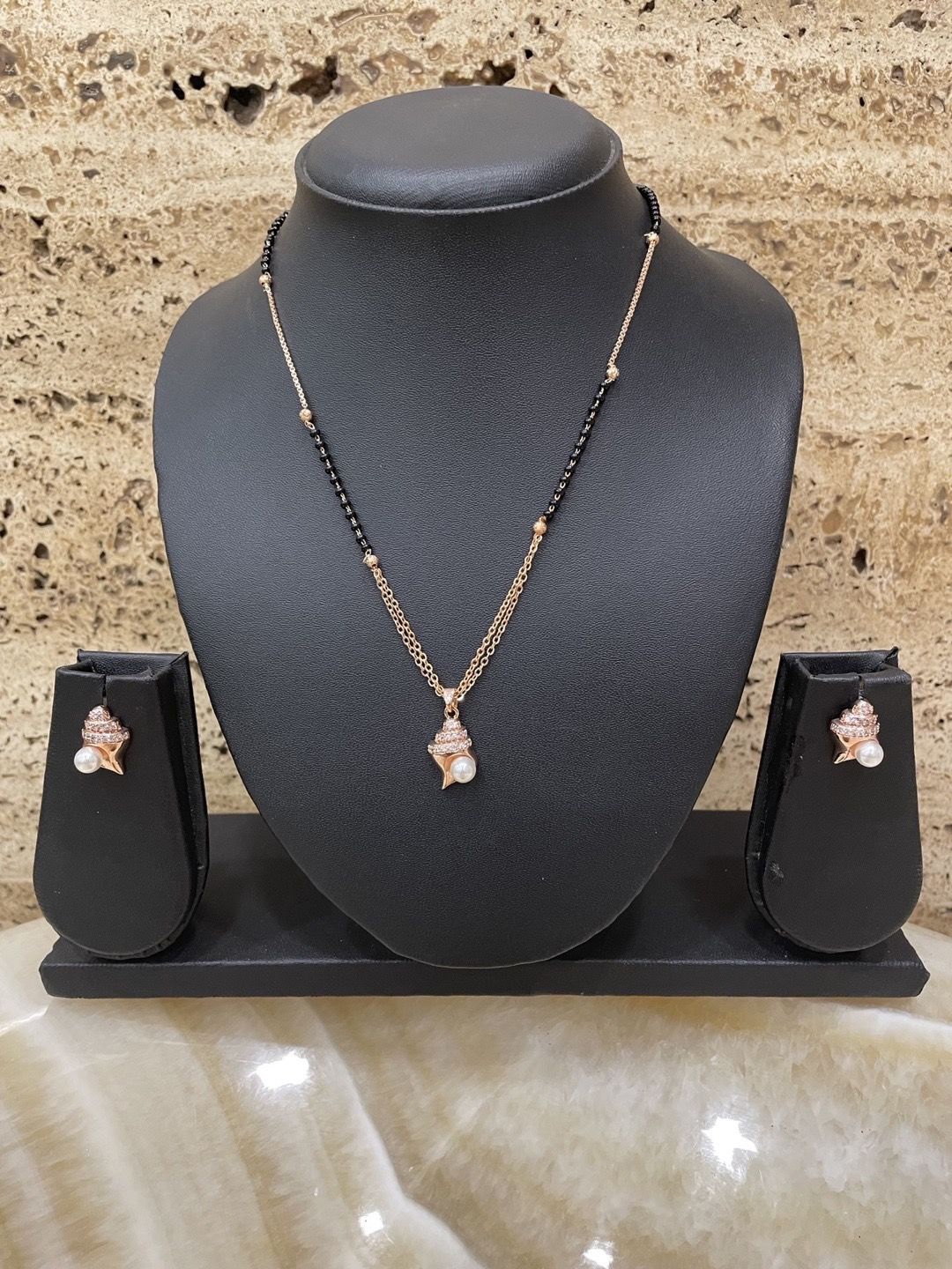 

Digital Dress Room Rose Gold-Plated AD-Studded & Beaded Mangalsutra & Earrings