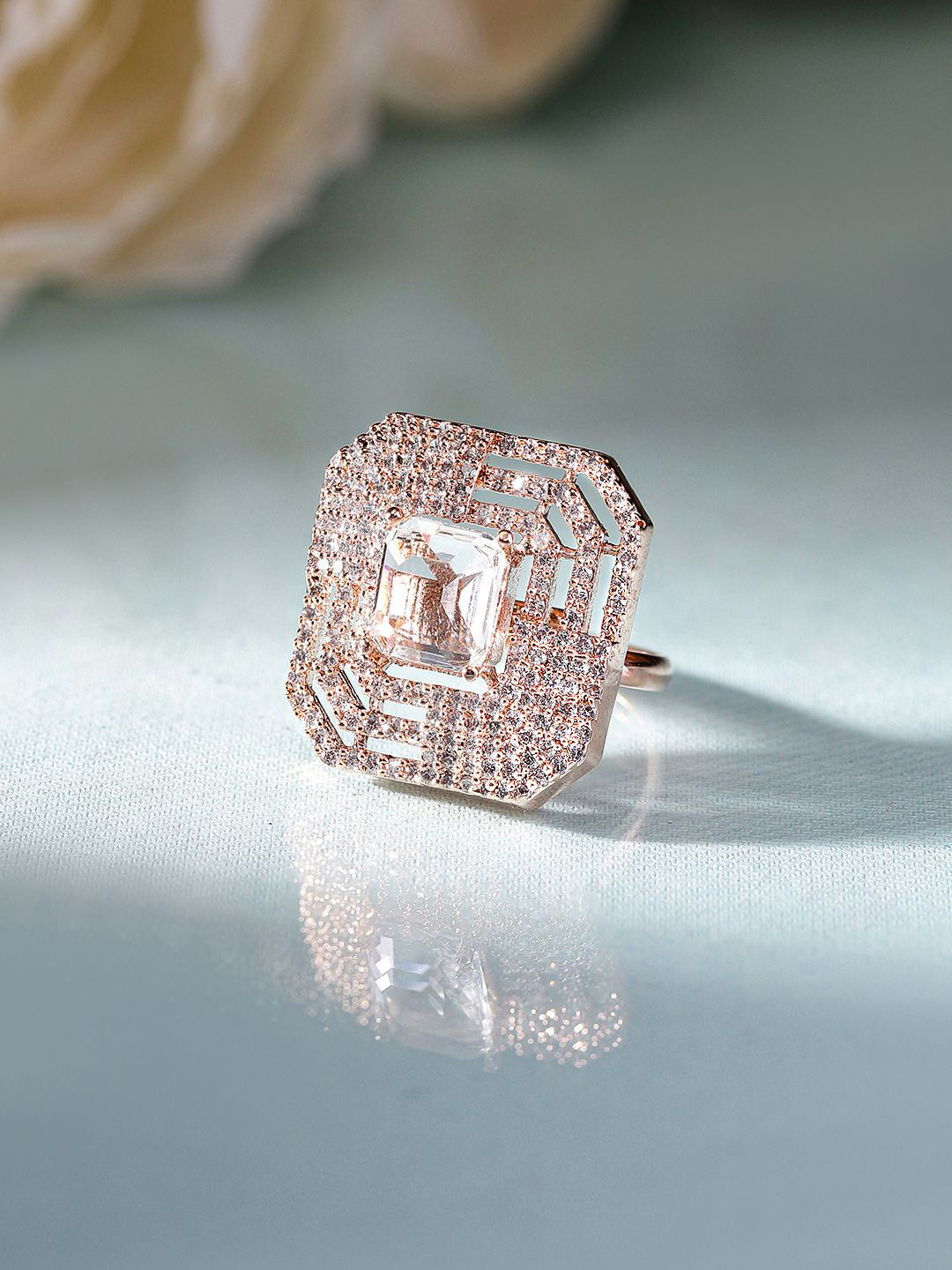 

Priyaasi Rose Gold-Plated Geometric American Diamond Stone Studded Adjustable Finger Ring
