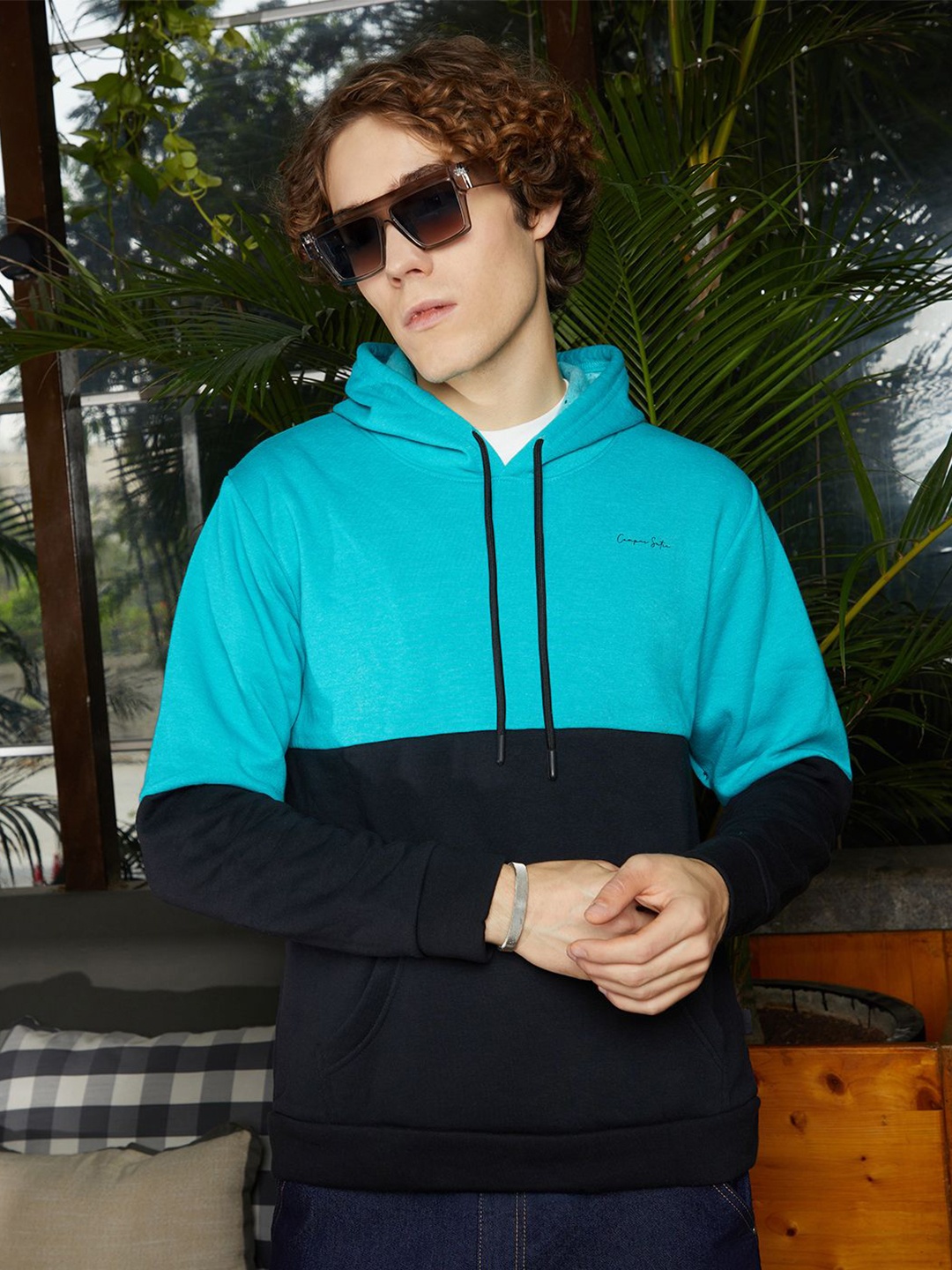

Campus Sutra Men Cotton Colourblocked Hooded Long Sleeves Pullover Sweatshirt, Turquoise blue