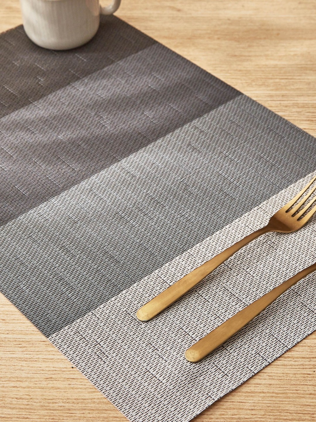 

Home Centre Edan 6-Pcs Grey & Black Rectangle PVC Table Placemats