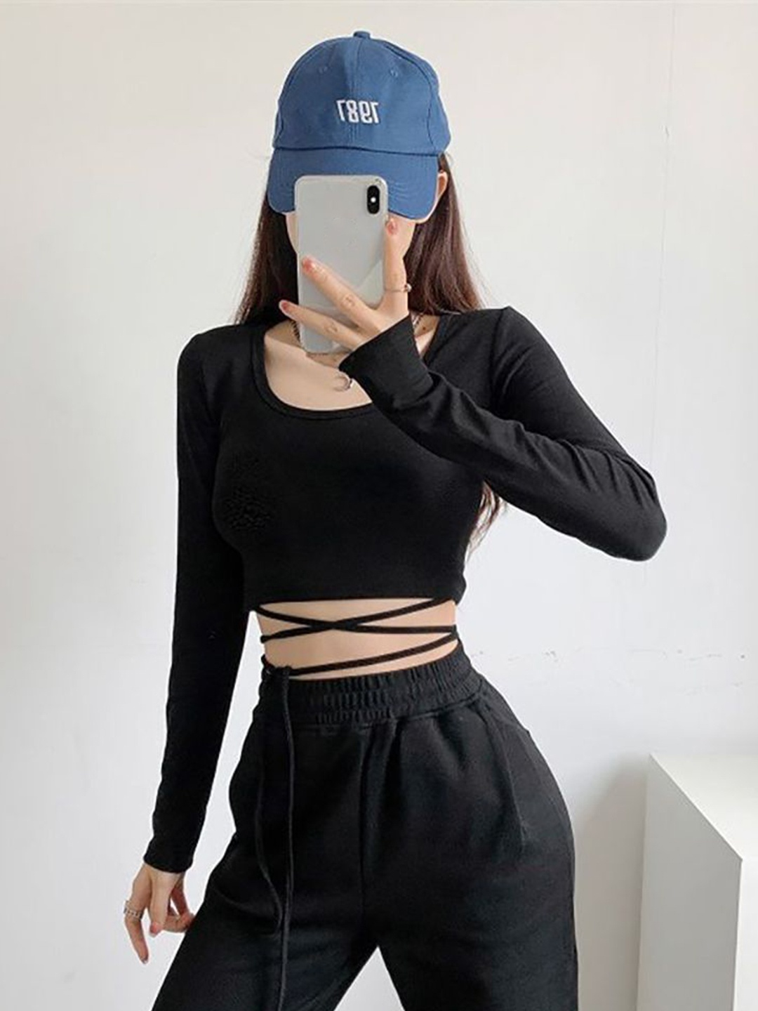 

StyleCast x Revolte Women Solid Round Neck Top, Black