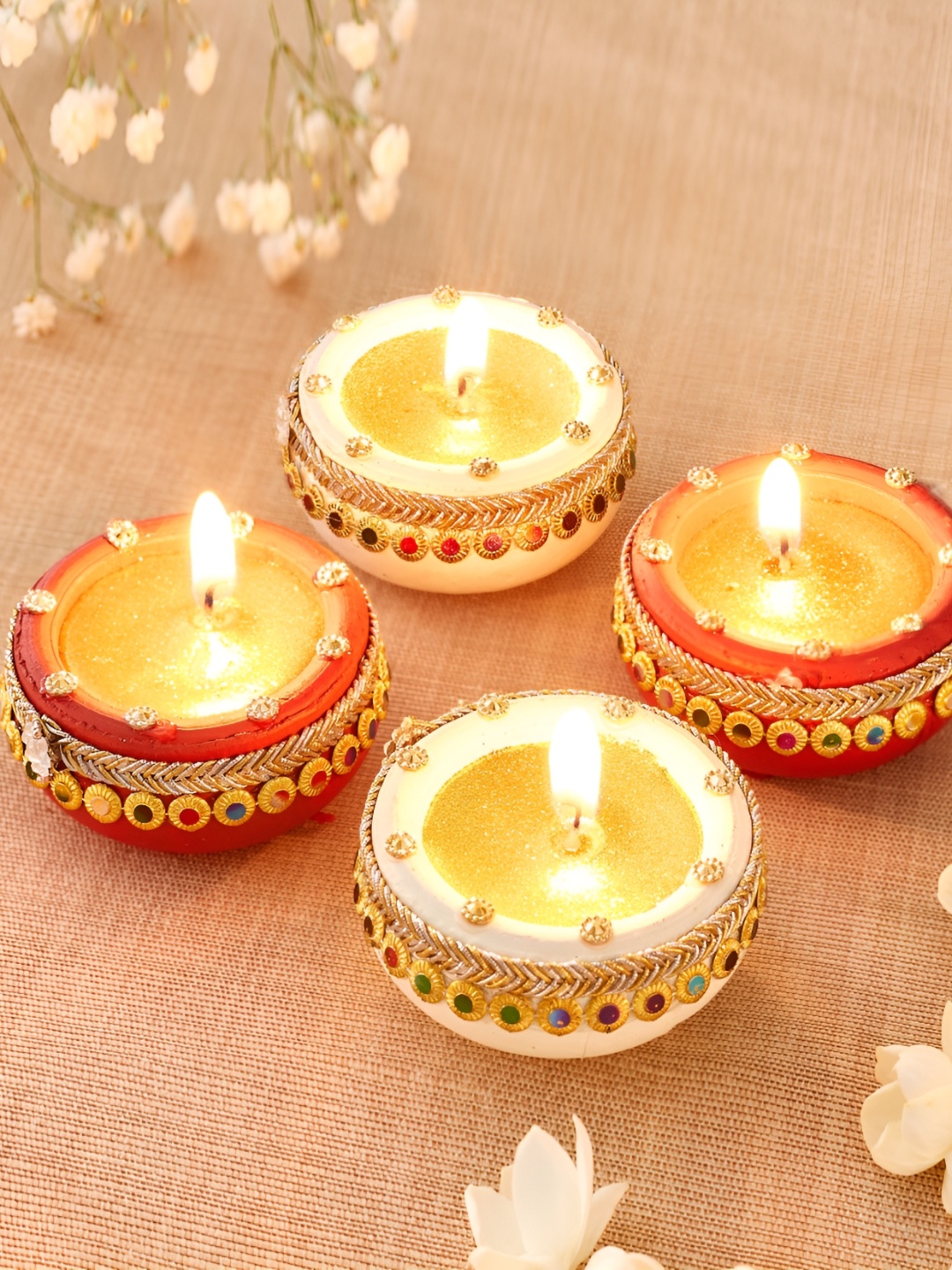 

Home Centre Red & Yellow 4 pieces Tea Light Candle