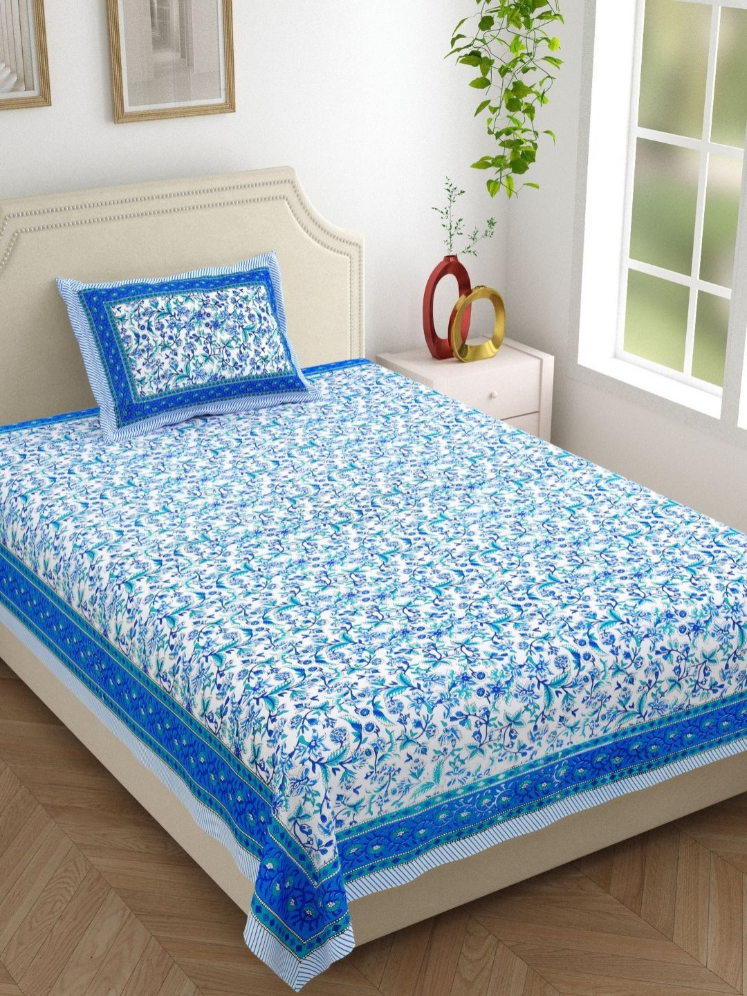 

The Craft Monk Blue & White Floral Pure Cotton 210 TC Single Bedsheet Set-2.28 m x 1.52 m