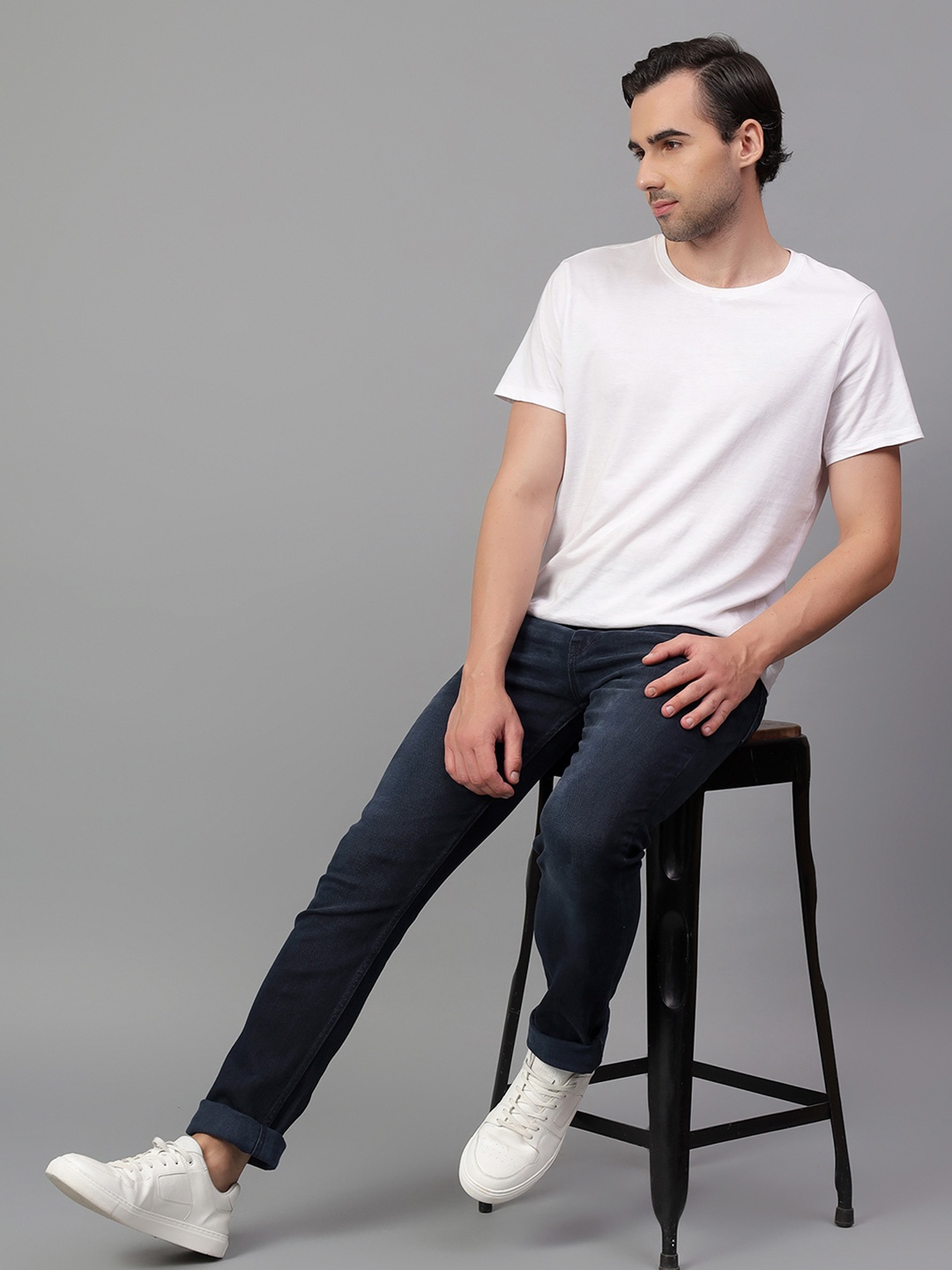 

Cantabil Men Light Fade Navy Blue Solid Stretchable Jeans