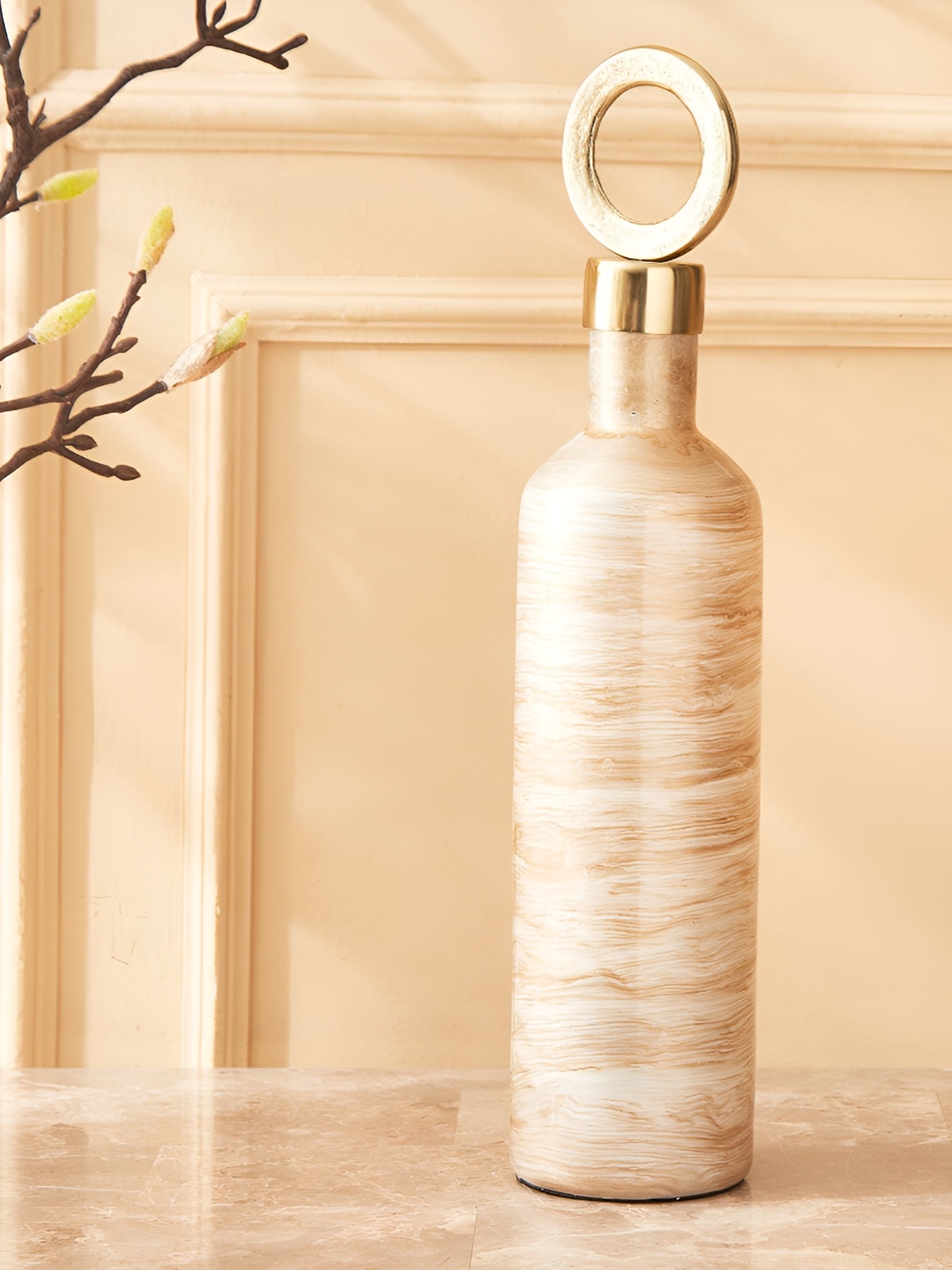 

Home Centre Eternity Viva Beige Curio Glass and Metal Decorative Bottle Showpiece