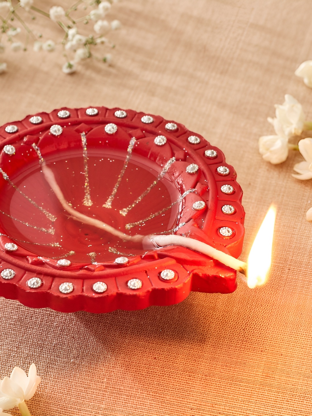 

Home Centre Red Candle Holder