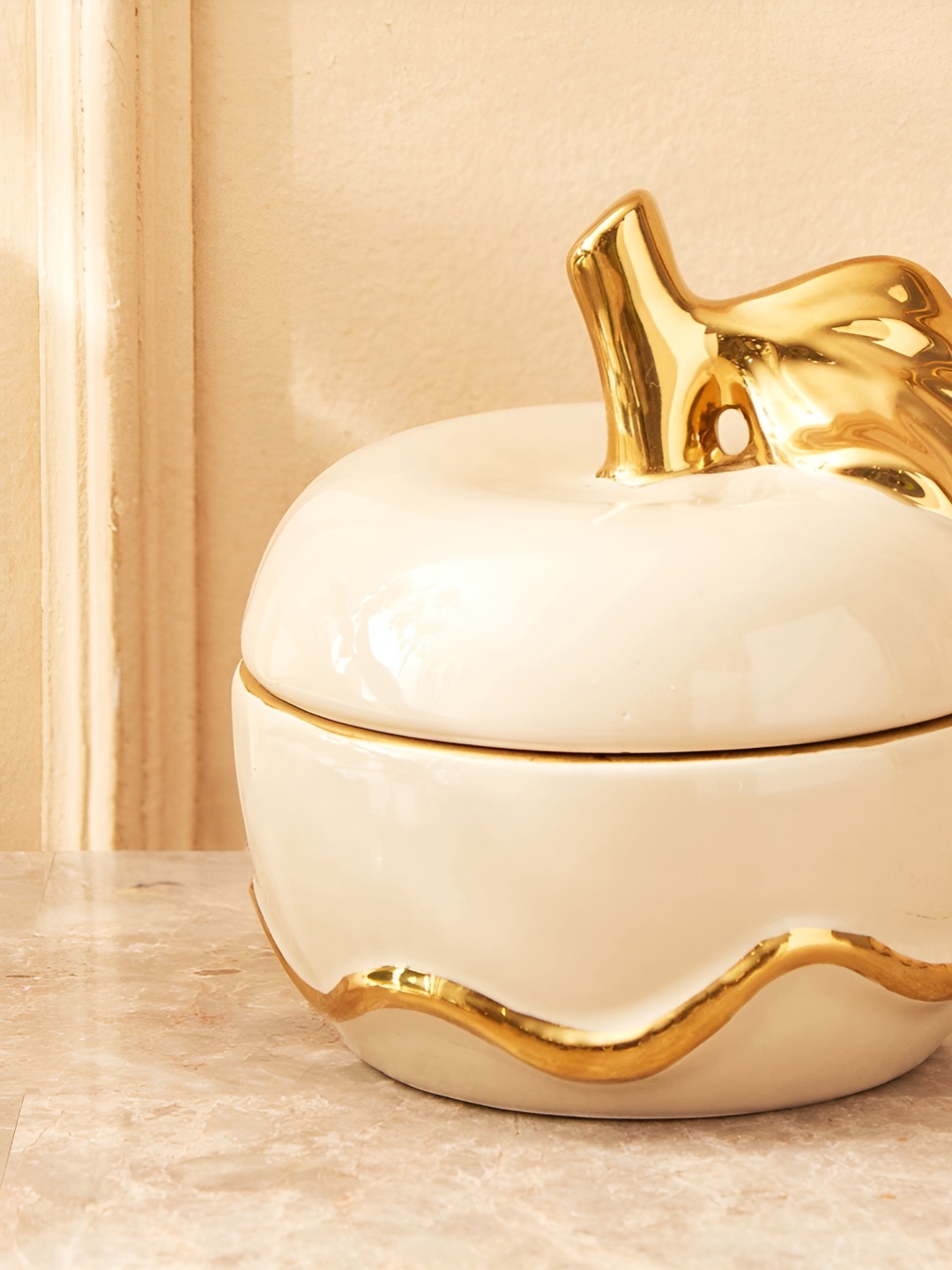 

Home Centre Beige Idol Showpiece