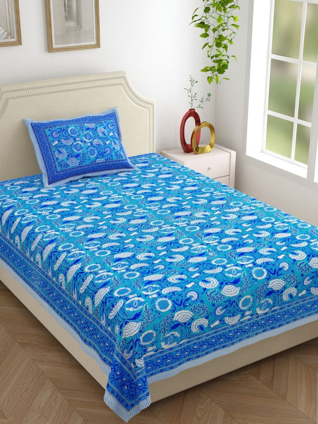 

The Craft Monk Blue & White Floral Pure Cotton 210 TC Single Bedsheet Set-2.28 m x 1.52 m