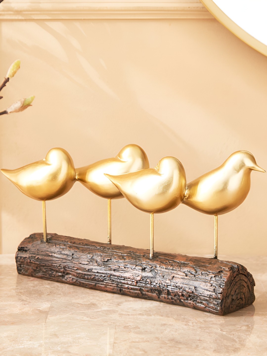 

Home Centre Gold-Toned Figurine Showpiece