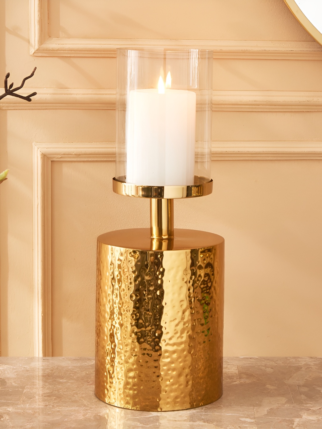 

Home Centre Eternity Viva Arc Gold-Toned and Transparent Glass Candle Holder