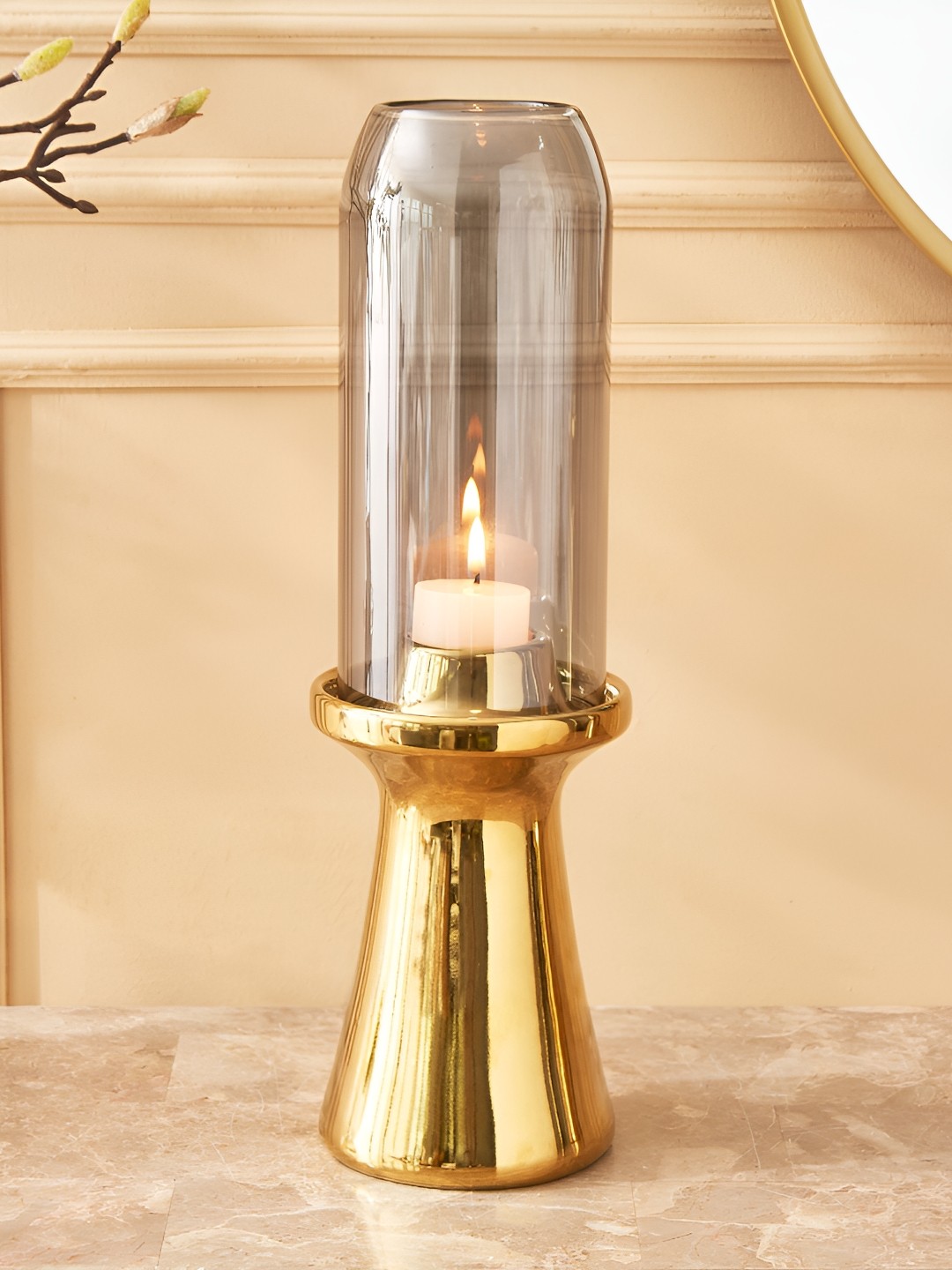 

Home Centre Eternity Viva Gold-Toned and Transparent Ceramic Candle Holder