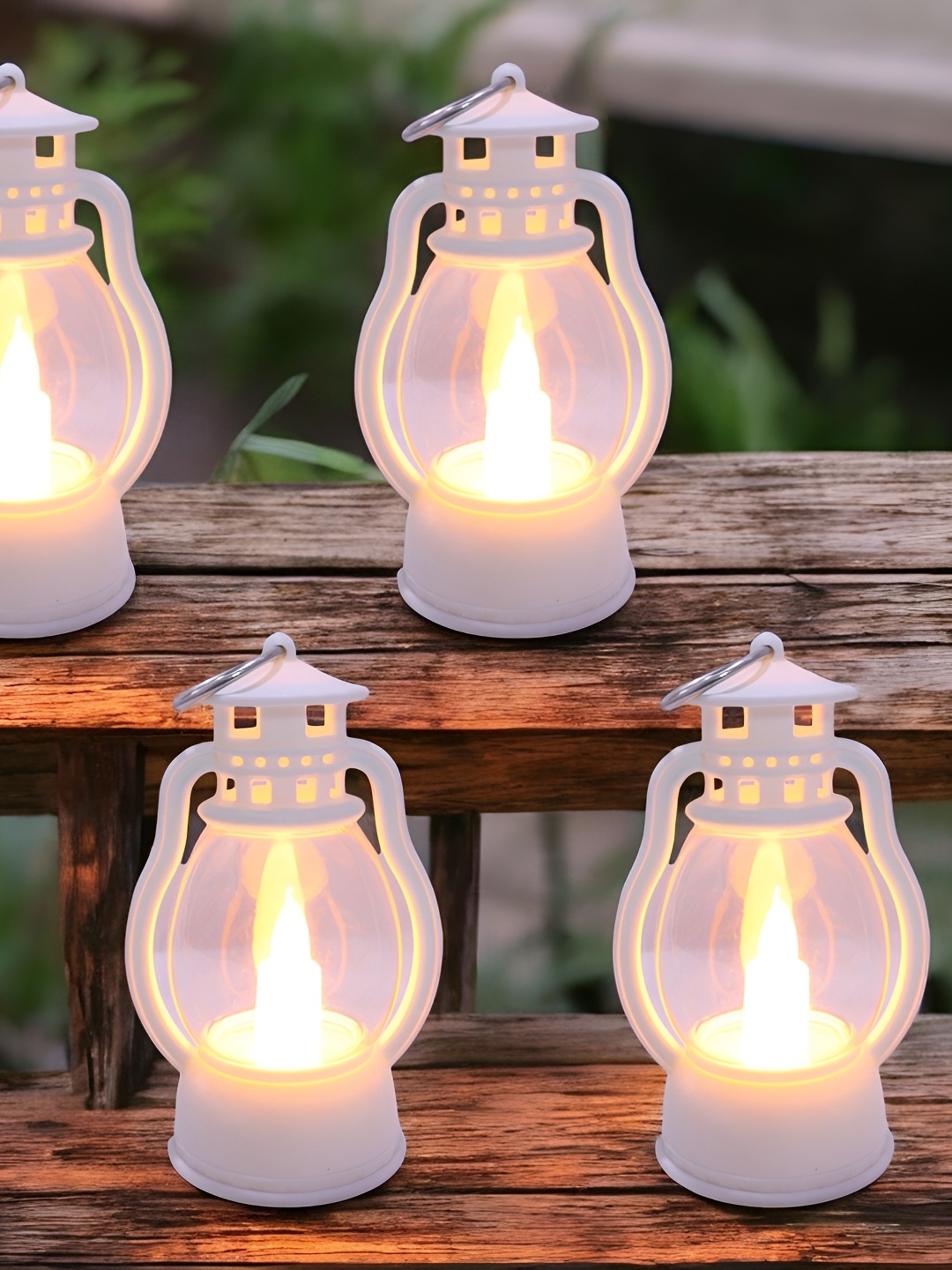 

Extreme Karigari White & Transparent Set of 4 Candle Holder