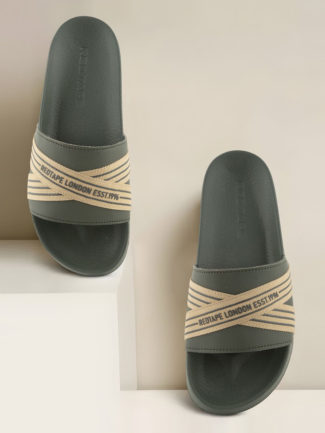 

Red Tape Men Self Design Sliders, Olive