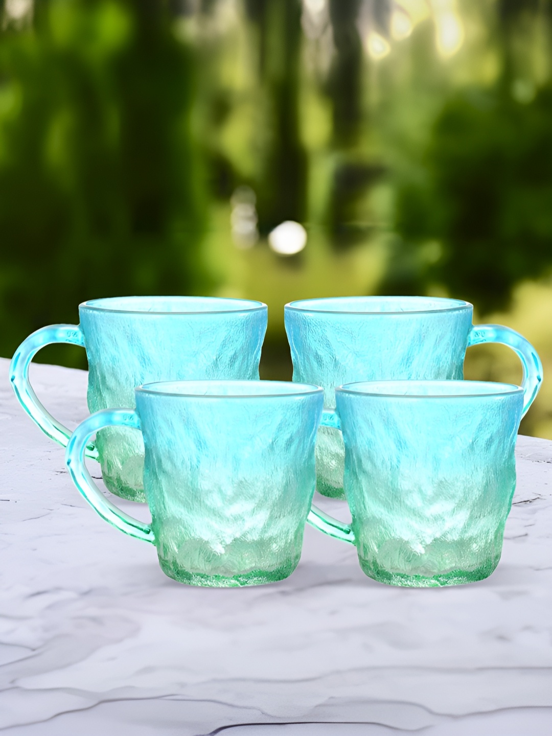

The Better Home Blue 4 Pieces Textured Glass Dishwasher Safe Cups 280ml