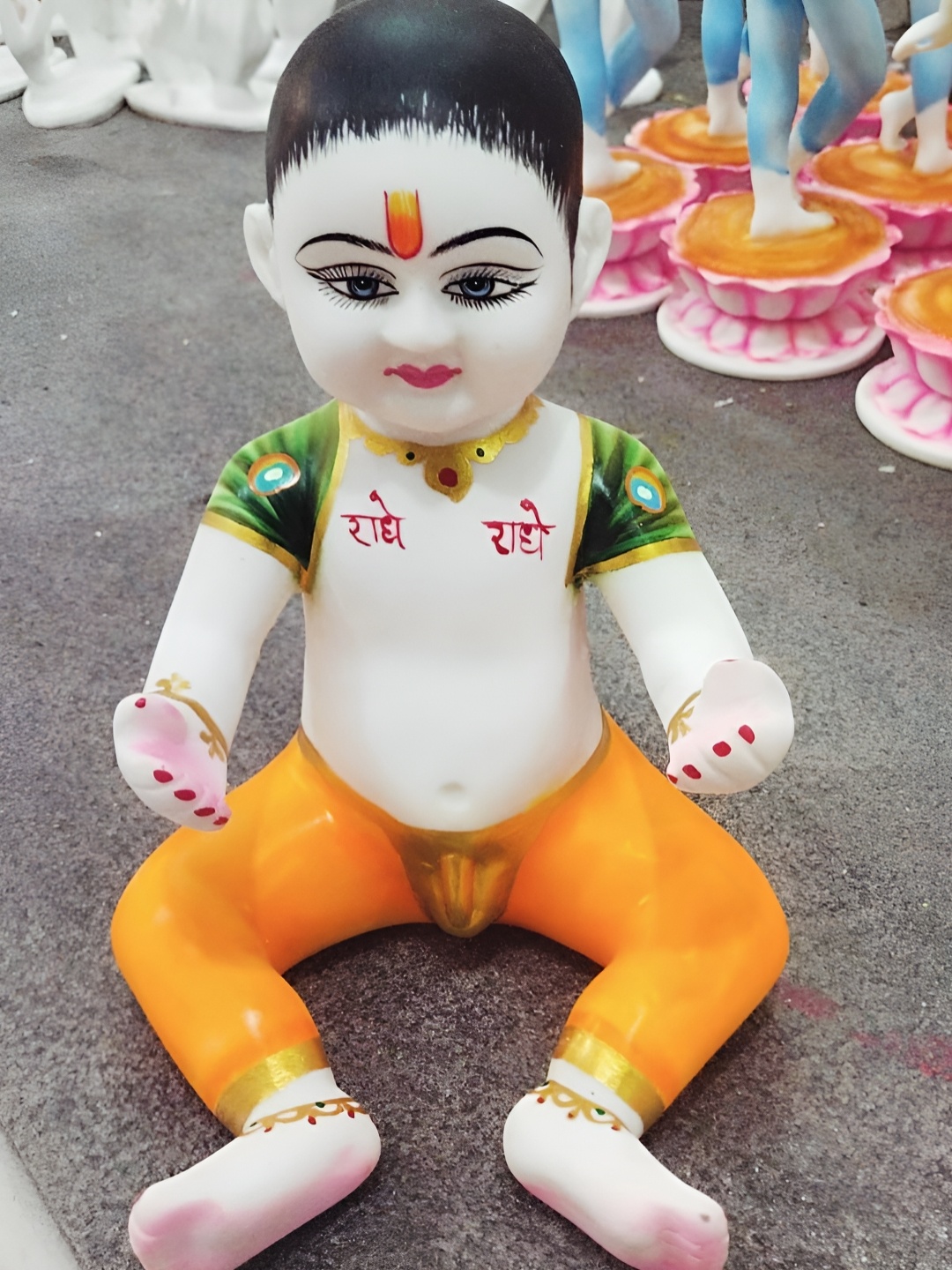 

krishnagallery1 White & Orange Colored Lord Gopal Idol Showpiece