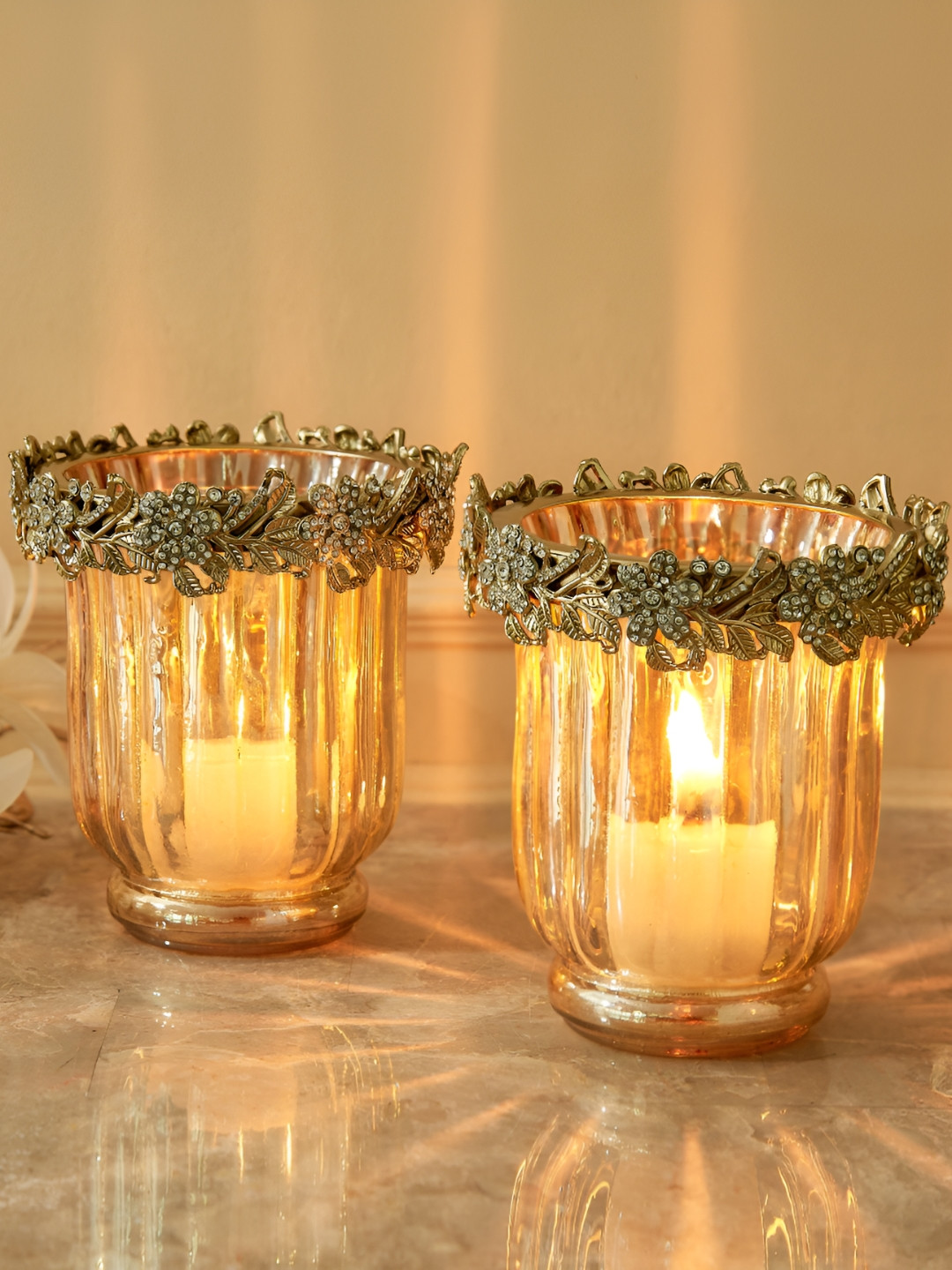 

Home Centre Fables Glitz Gold-Toned 2 Pieces Glass Floral Votive Candle Holders